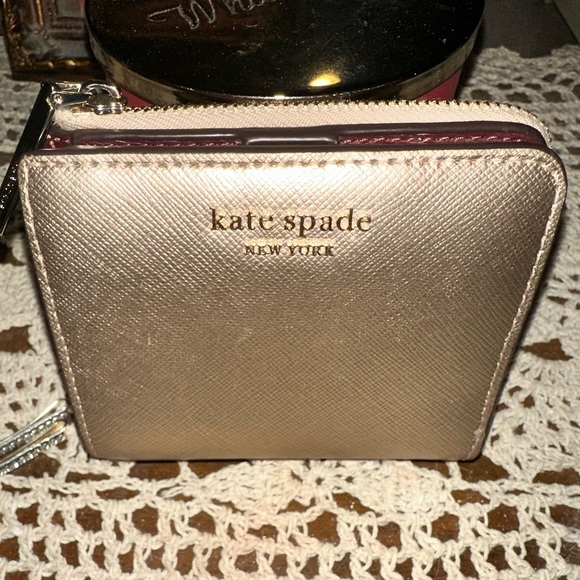 kate spade Handbags - KATE Spade Rose Gold Leather Spencer Compact Wallet EUC